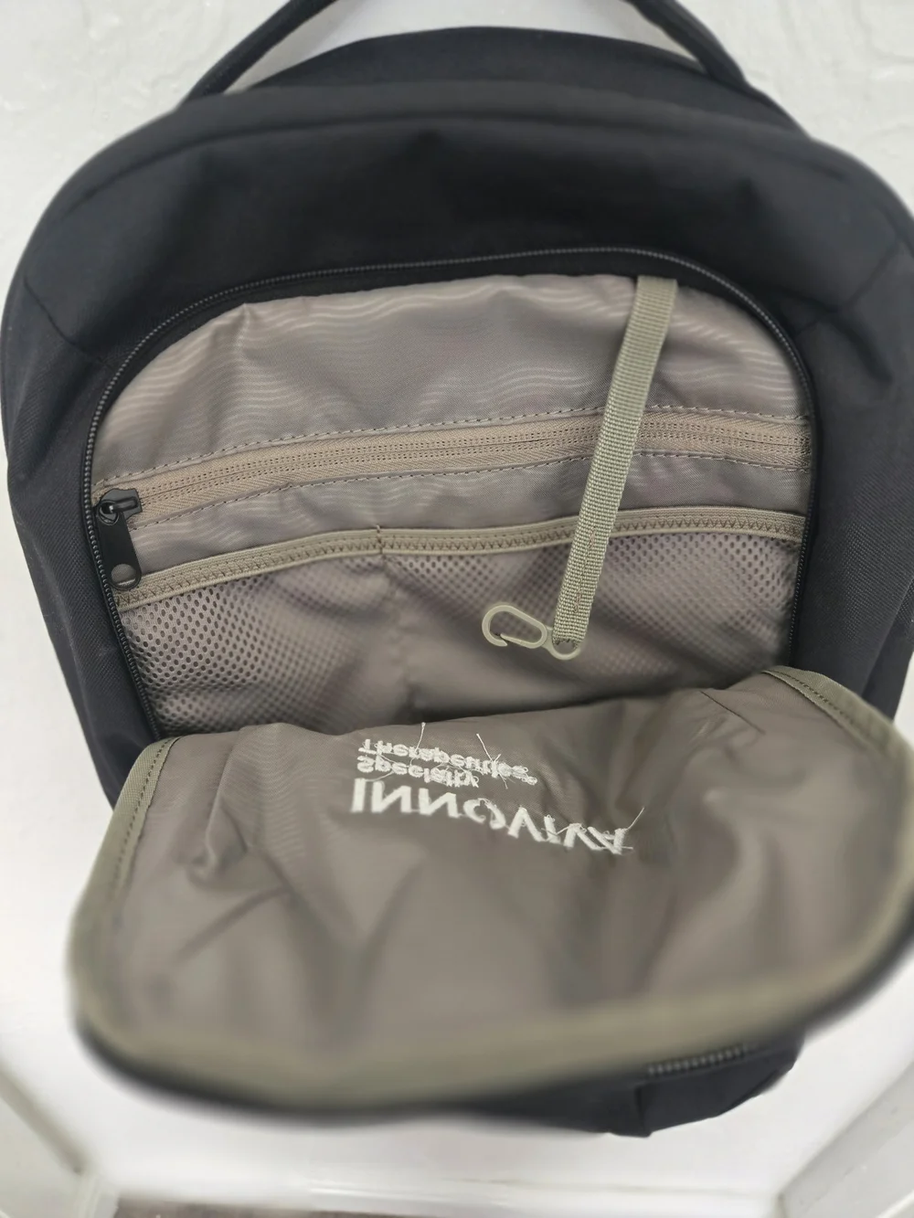 Thule Black Backpack with Innoviva Specialty Therapeutics Logo